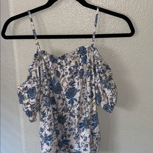 Blouse that is floral and can be off the shoulder